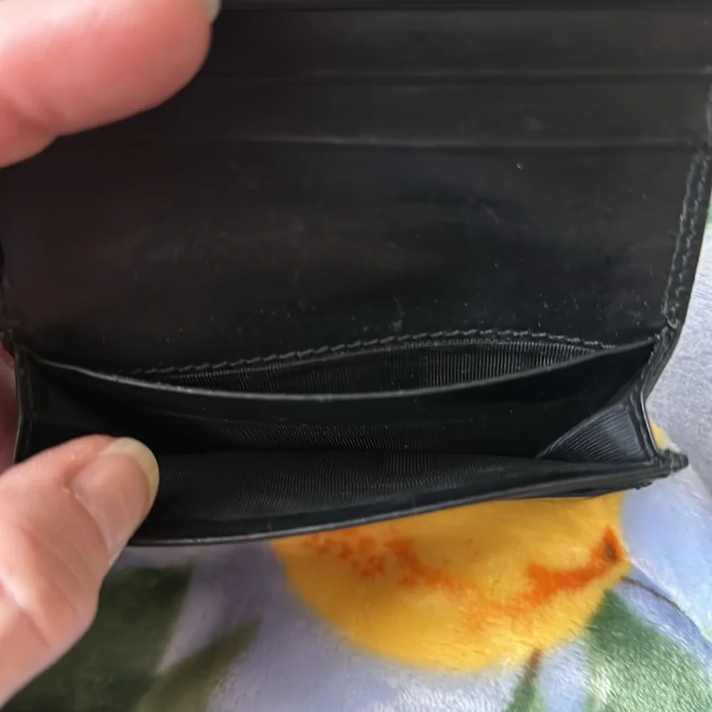 Gucci Black Embossed Leather Bi-Fold Wallet